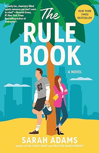 Cover of 'The Rule Book' by Sarah Adams, featuring a man in a sports uniform and a woman in casual attire standing under a palm tree with a beach in the background.