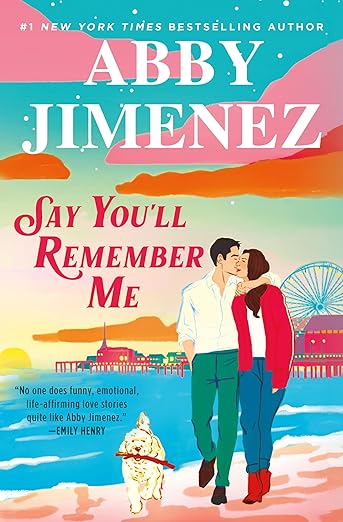 Cover of 'Say You'll Remember Me' by Abby Jimenez, featuring a couple in a romantic pose with a beach and a ferris wheel in the background.